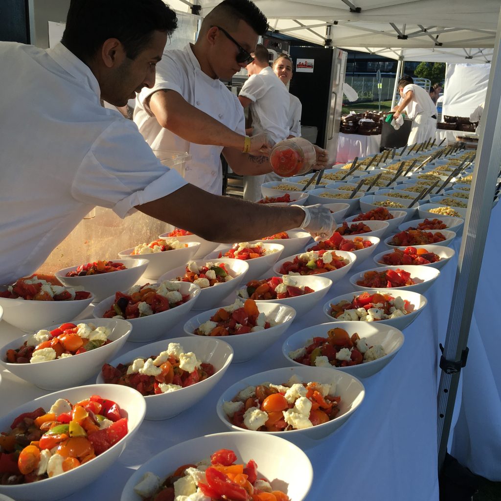 La Diner en Blanc Vancouver preparing meals